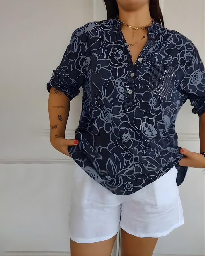 Γυναικεία λινή floral μπλούζα με πατιλέτα με κουμπιά και τσέπη με παγιέτες