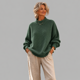 Γυναικείο πλεκτό oversized πουλόβερ με όρθιο γιακά και ασύμμετρο τελείωμα