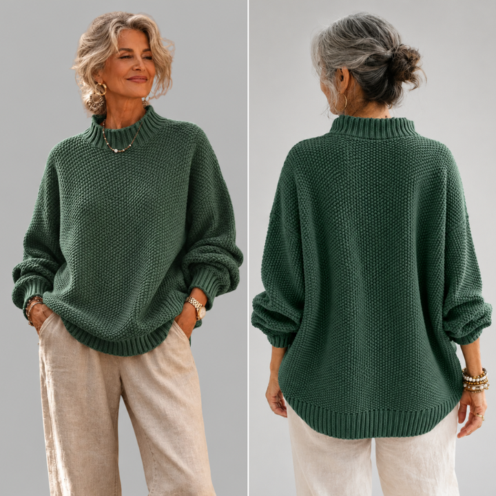 Γυναικείο πλεκτό oversized πουλόβερ με όρθιο γιακά και ασύμμετρο τελείωμα