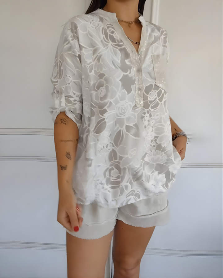 Γυναικεία λινή floral μπλούζα με πατιλέτα με κουμπιά και τσέπη με παγιέτες