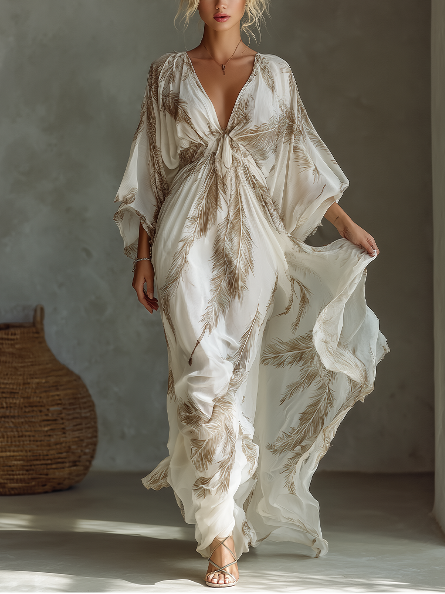 Dámské maxi šaty z šifonu s netopýřími rukávy, výstřihem do V a potiskem palmových listů