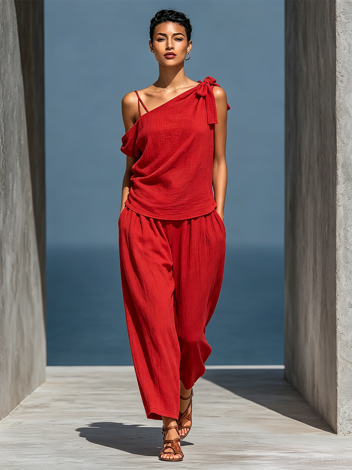 Dámský komplet z lnu s asymetrickým topem na jedno rameno a kalhotami se širokými nohavicemi