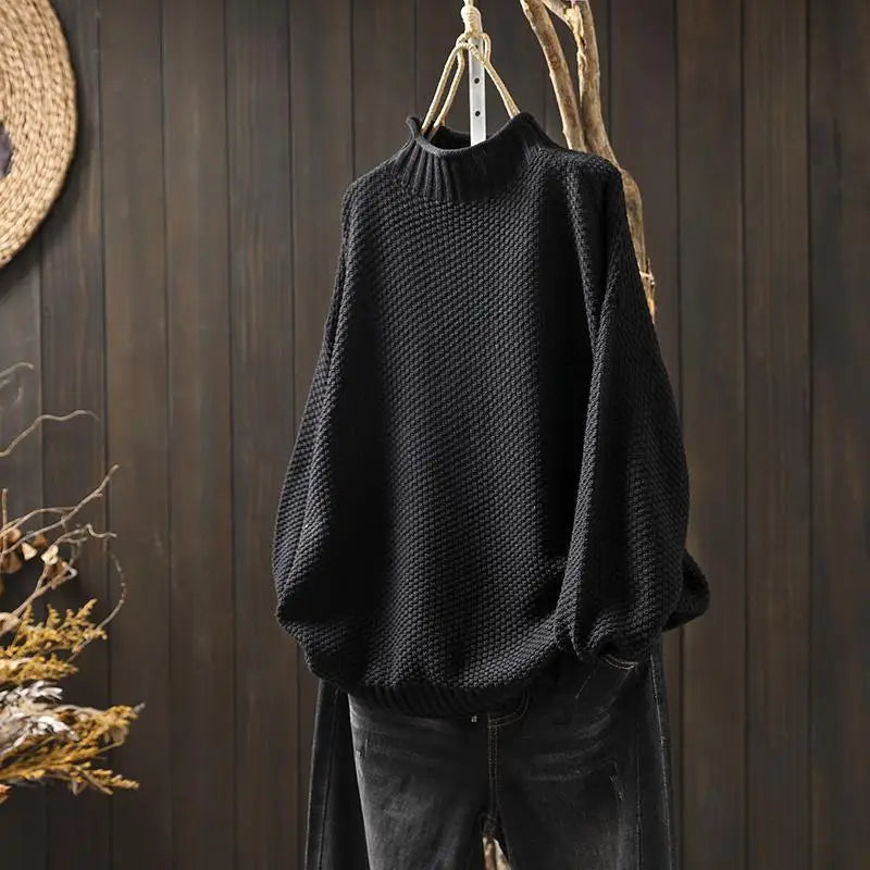 Γυναικείο πλεκτό oversized πουλόβερ με όρθιο γιακά και ασύμμετρο τελείωμα