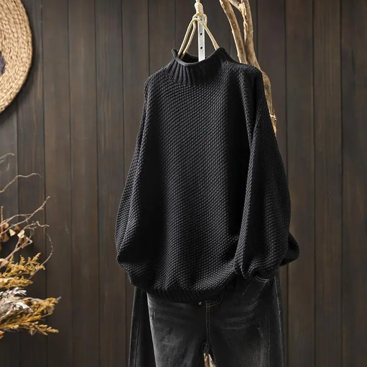 Γυναικείο πλεκτό oversized πουλόβερ με όρθιο γιακά και ασύμμετρο τελείωμα
