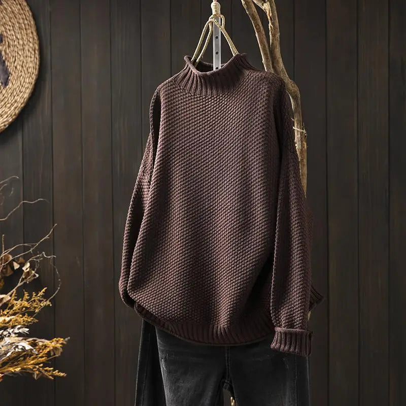 Γυναικείο πλεκτό oversized πουλόβερ με όρθιο γιακά και ασύμμετρο τελείωμα