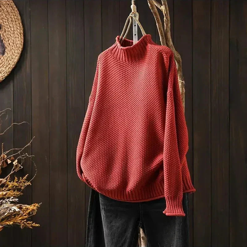 Γυναικείο πλεκτό oversized πουλόβερ με όρθιο γιακά και ασύμμετρο τελείωμα