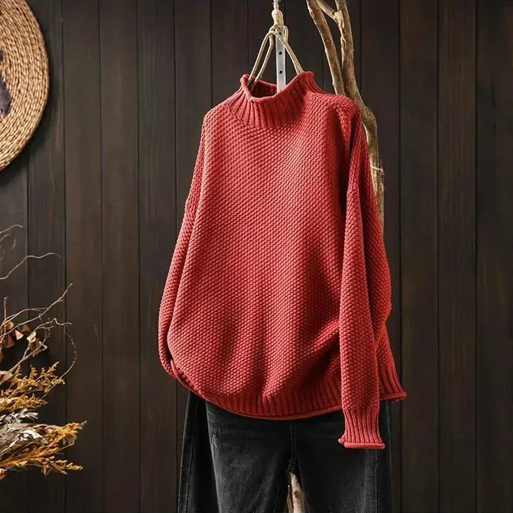 Γυναικείο πλεκτό oversized πουλόβερ με όρθιο γιακά και ασύμμετρο τελείωμα