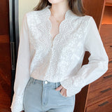 Blouse en lin brodée pour femme, à col en V et manches longues