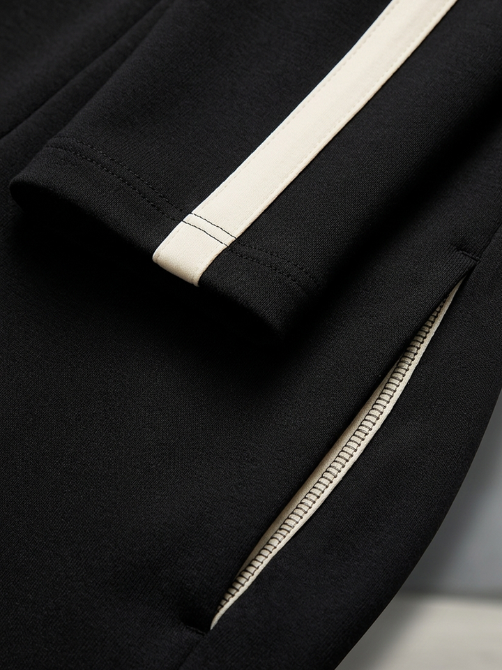 Combinaison-pantalon en maille à manches longues, jambes larges, rayée et zippée pour femme