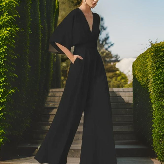 Elegantní dámský overal ze šifonu s výstřihem do V, polovičními rukávy a širokými nohavicemi