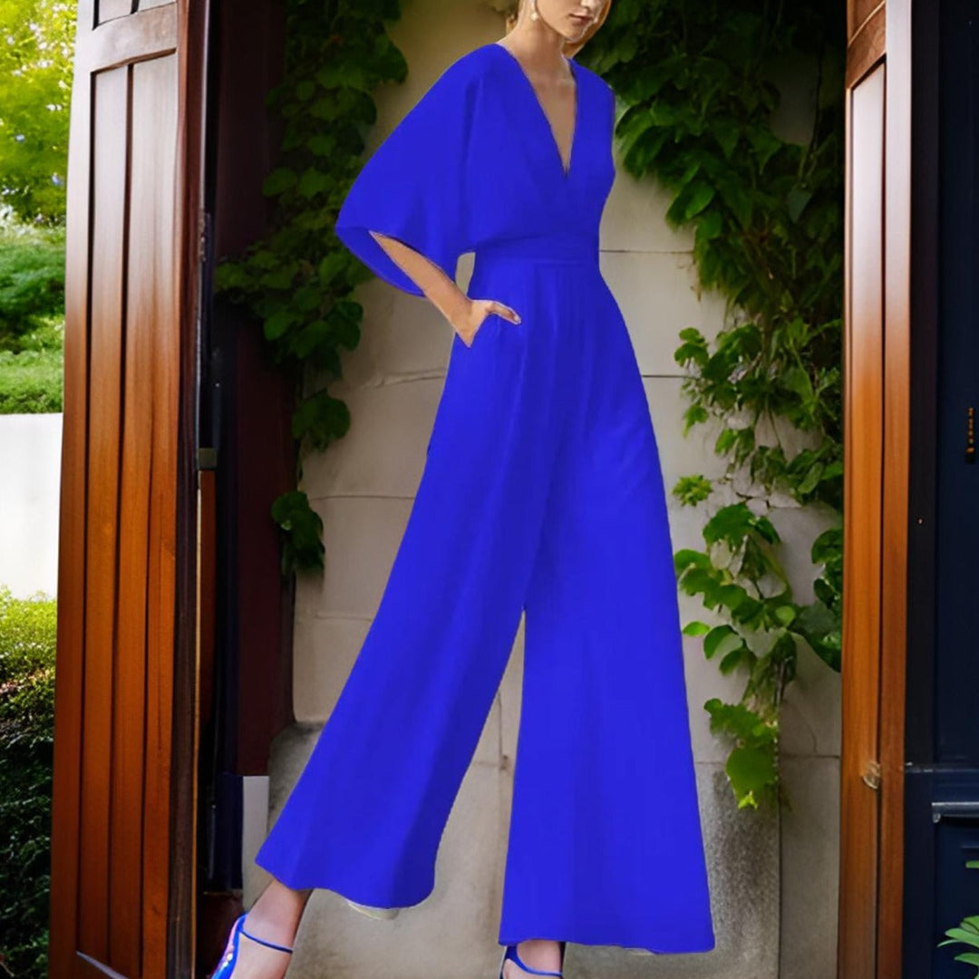 Elegantní dámský overal ze šifonu s výstřihem do V, polovičními rukávy a širokými nohavicemi