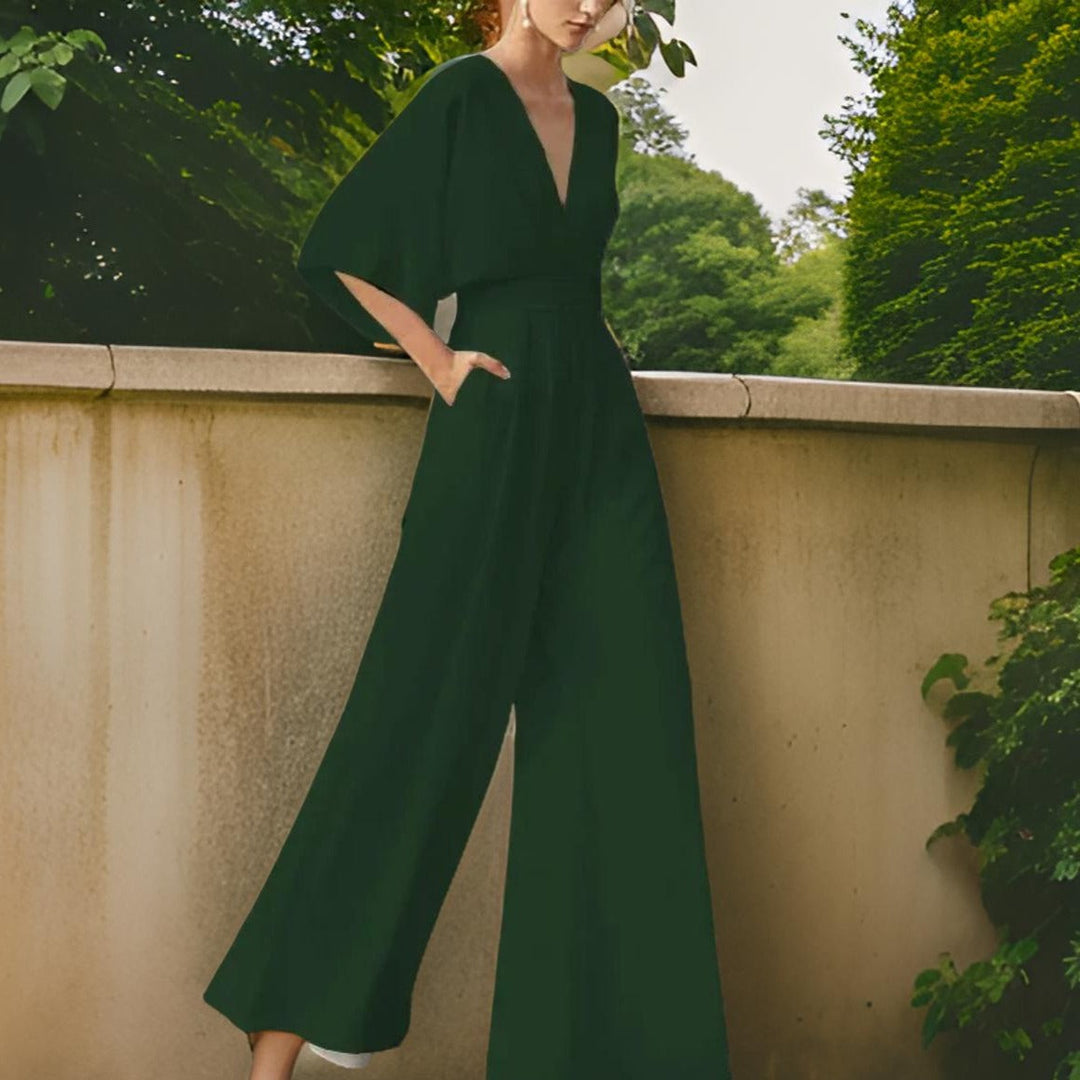 Elegantní dámský overal ze šifonu s výstřihem do V, polovičními rukávy a širokými nohavicemi