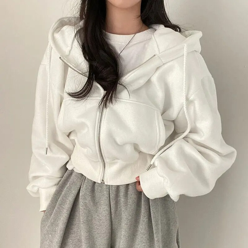 Dámská pletená mikina s kapucí na stahovací šňůrku a zapínáním na zip po celé délce