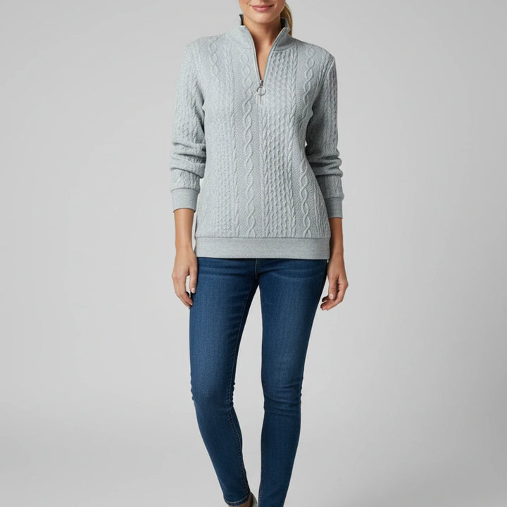Dámský svetr s vlněným copánkovým vzorem a čtvrtým zipem